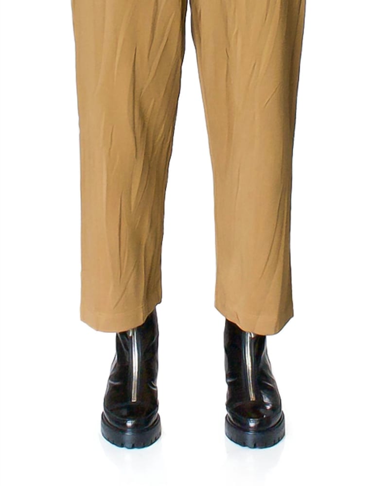 Front of a model wearing a size L Crinkle-Effect Sweatpants in Camel in Camel by Maison Margiela. | dia_product_style_image_id:338126